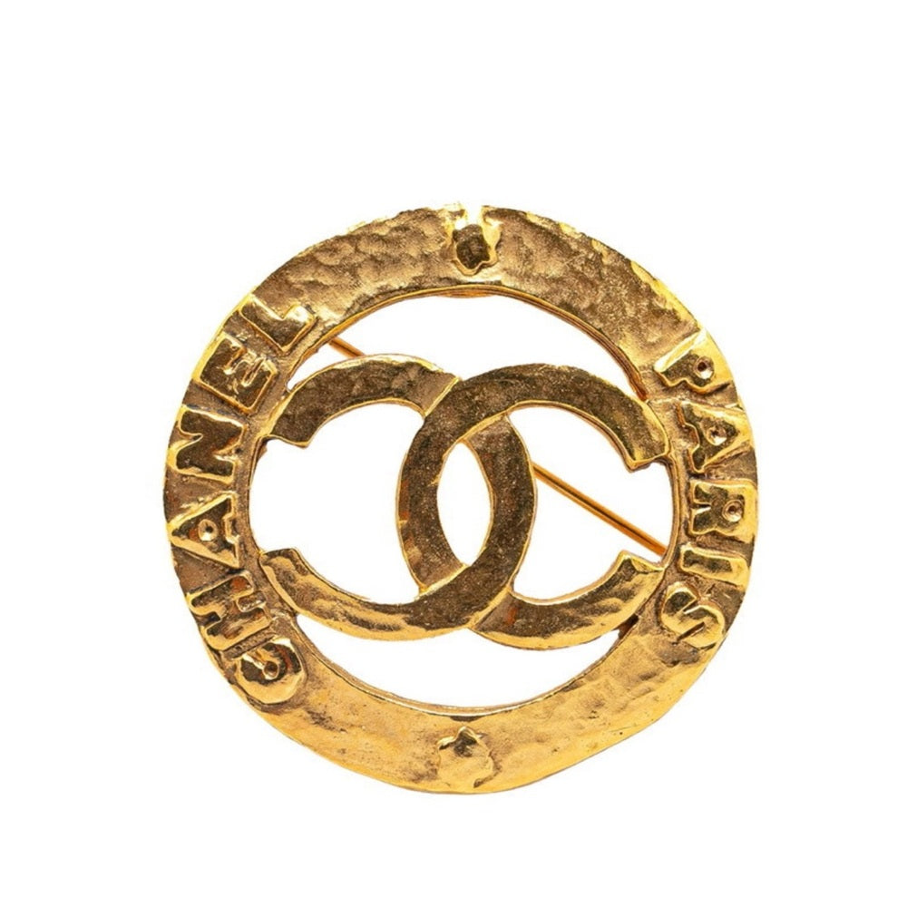 CHANEL Gold Brooch with Iconic CC Design
