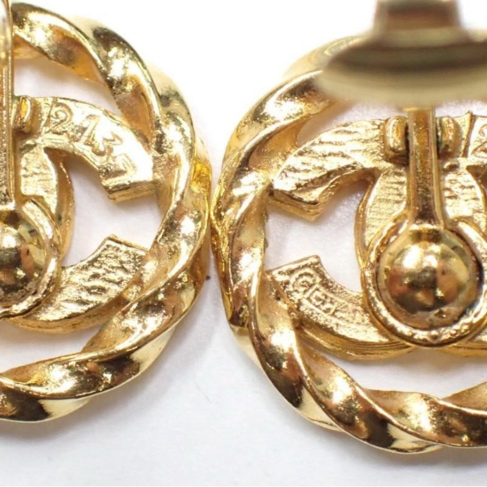 Authentic Chanel CC Rhinestone Clip on Earrings in Gold