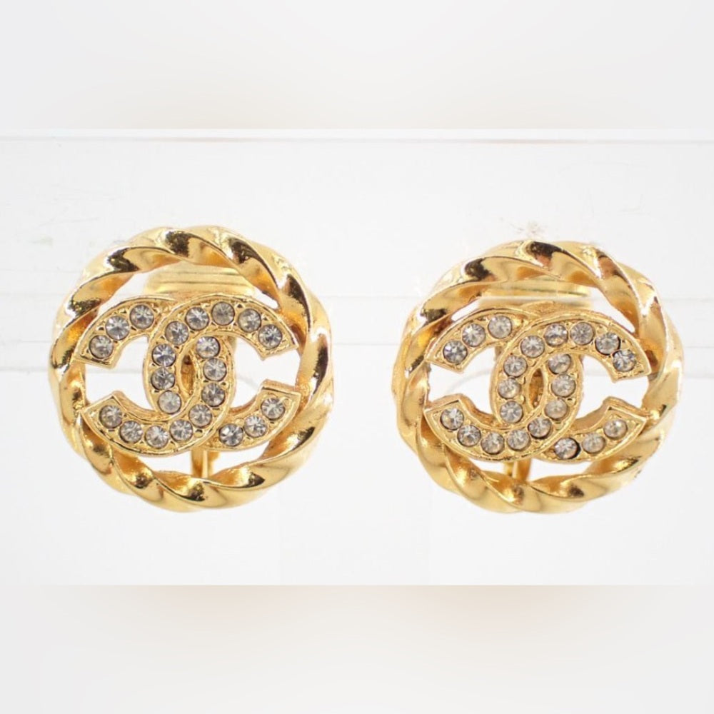 Authentic Chanel CC Rhinestone Clip on Earrings in Gold