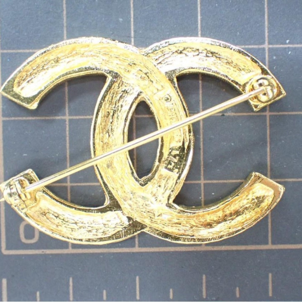 CHANEL Gold and Silver Crystal Brooch