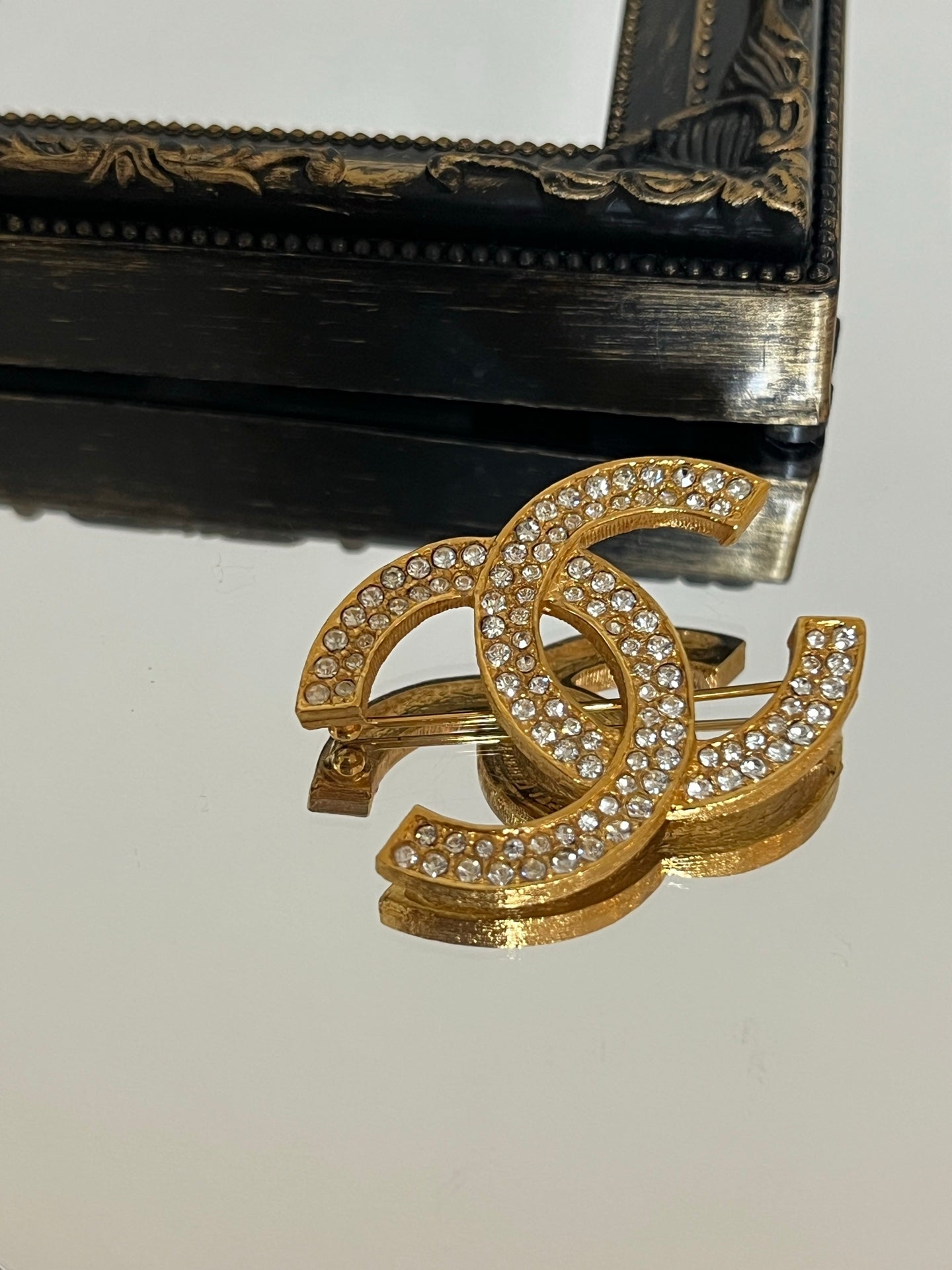 Chanel CC pin & brooche