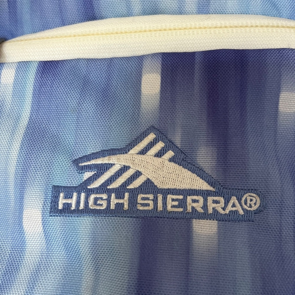 Mochila High Sierra azul con tres zonas con cremallera y correas ajustables