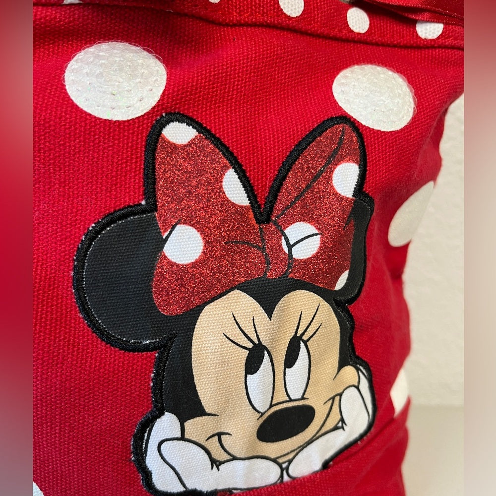 Bolso de mano de Minnie Mouse de Disney. Rojo con correas negras, lunares y cinta roja.