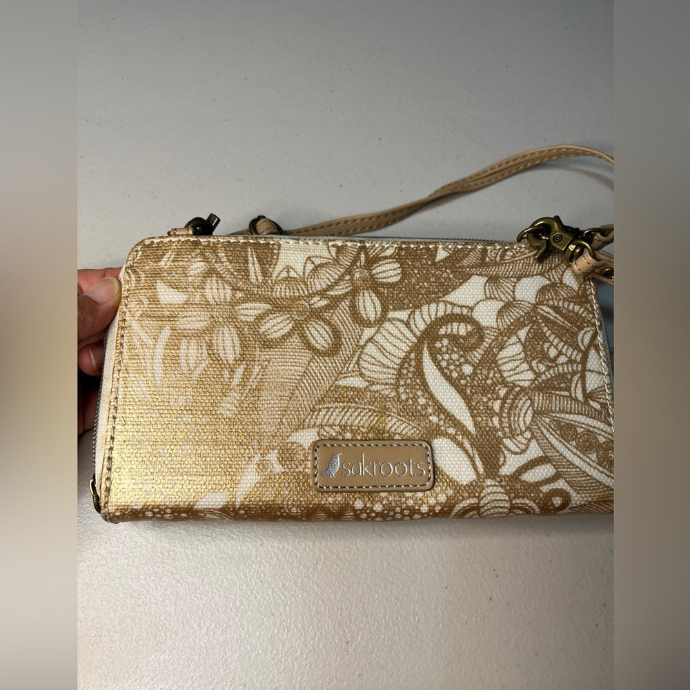 Cartera de mano con cremallera alrededor de Sakroots con solapa y sección para monedas, ver fotos, leer descripción.