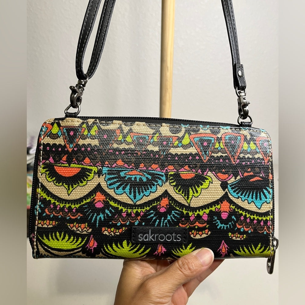 Bolsos y carteras tipo bandolera Sakroots con exterior de lona para mujer