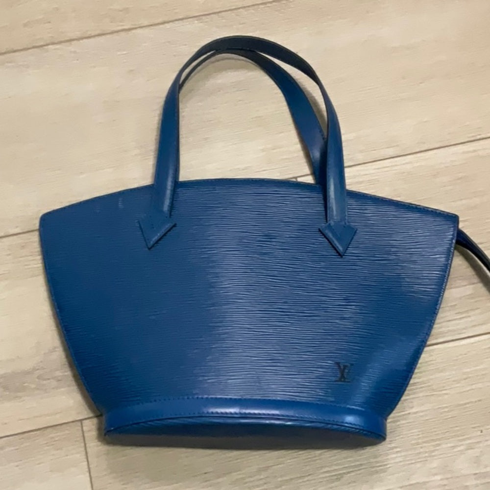 Bolso de mano de diseño de piel azul de Louis Vuitton