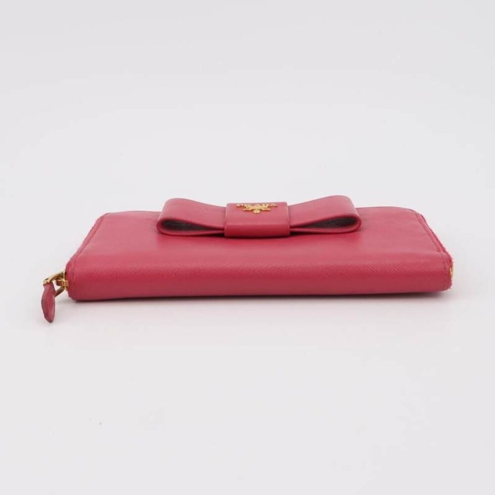 Cartera de piel de vaca con lazo rosa de Prada