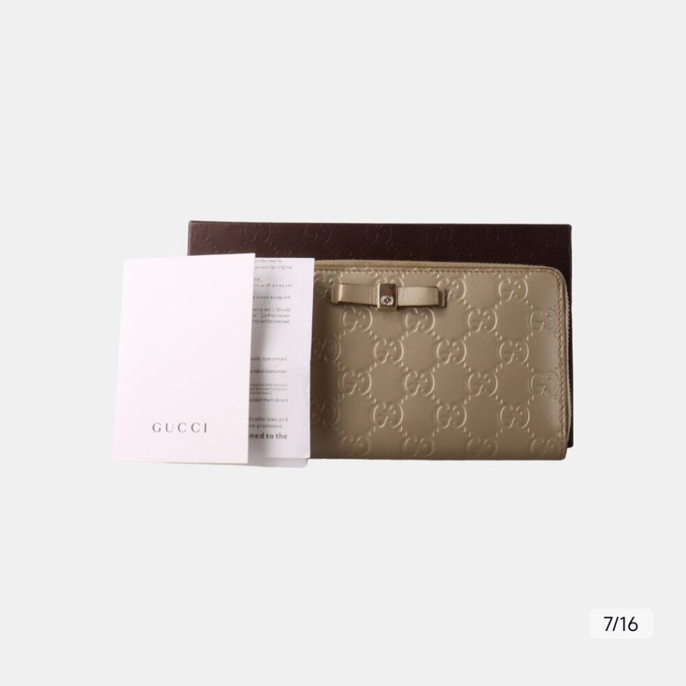 Gucci Metallic Beige Microguccissima Leather Bow Zip Around Wallet