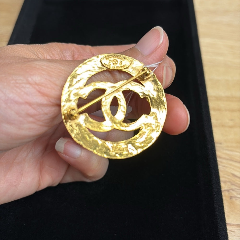 CHANEL Gold Brooch with Iconic CC Design